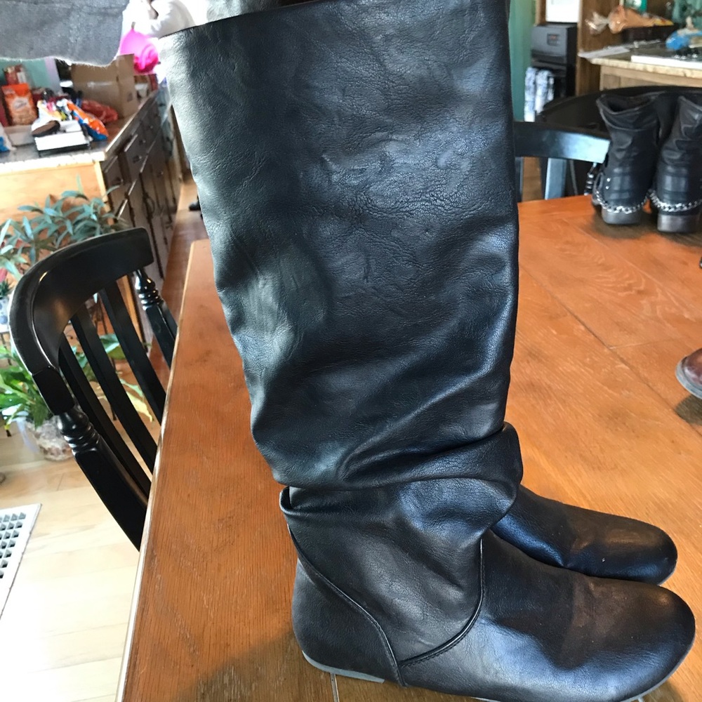 Tall black boots